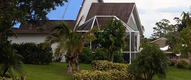 Lanai screen enclosure damaged in a hurricane