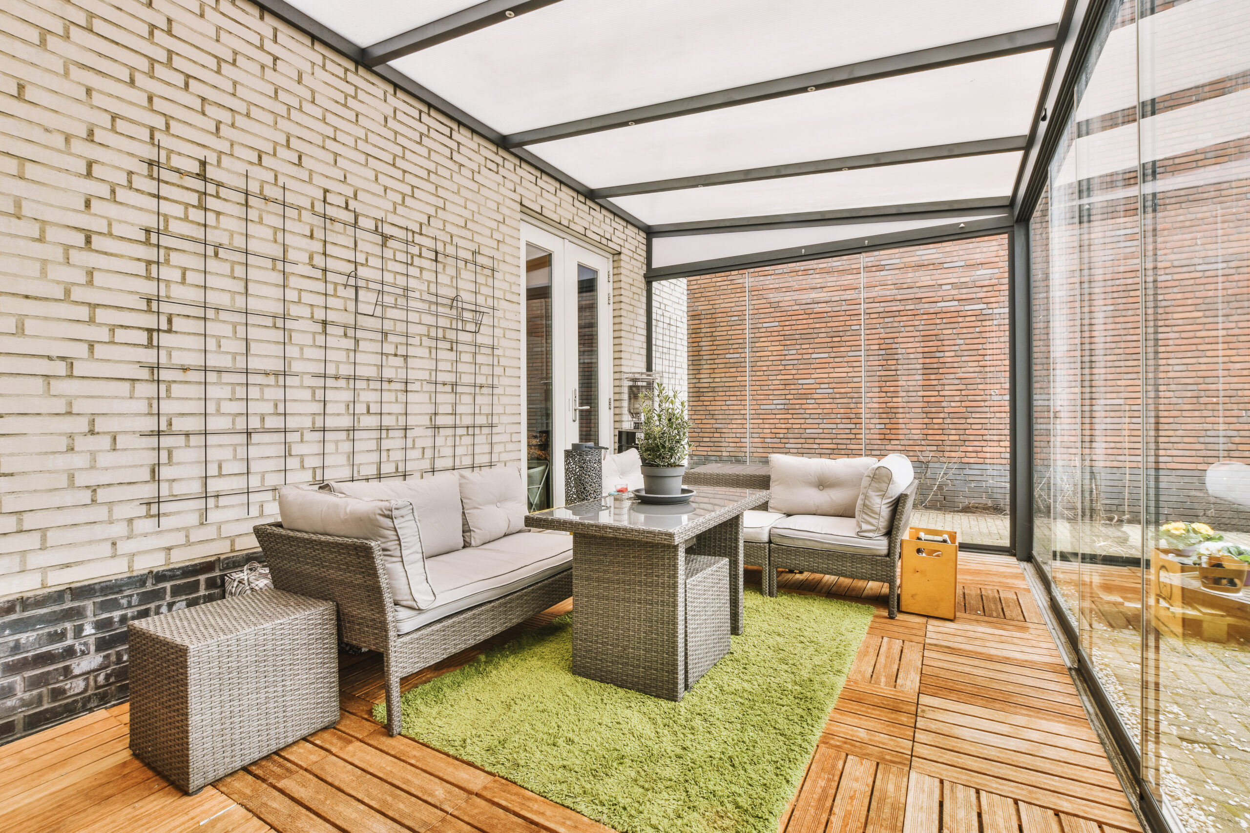 Neat covered patio with an outdoor sitting area
